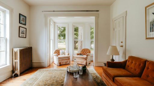 A living room filled with furniture and a fire place