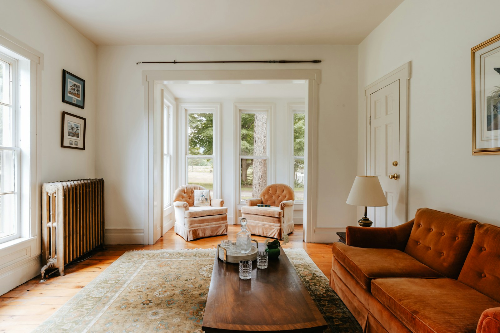 A living room filled with furniture and a fire place