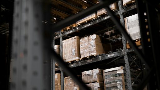 a warehouse filled with lots of boxes and pallets